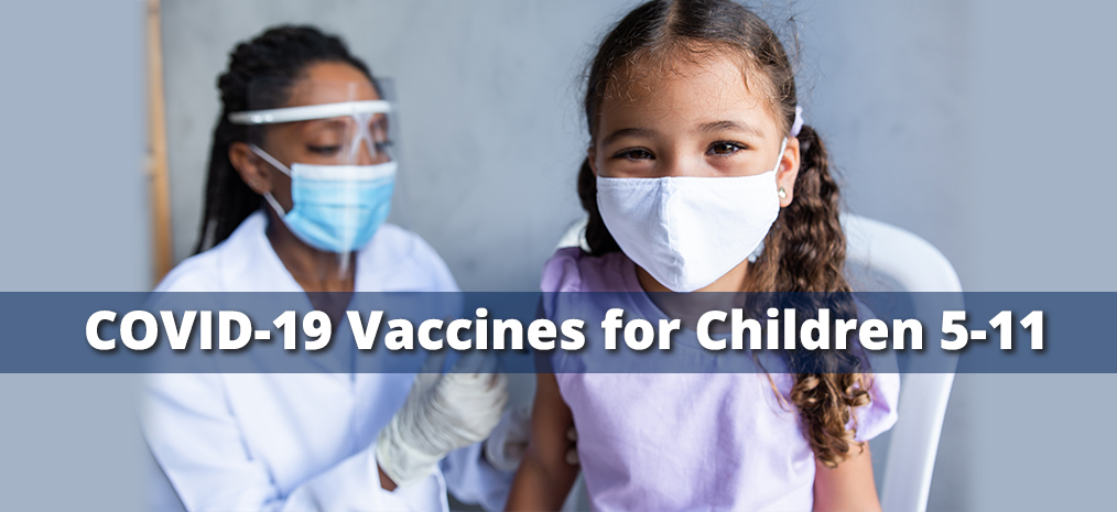 Covit-19 Vaccines for Children 5-11. Nurse and a child getting vaccine