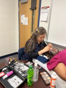 Teacher and a parent get manicure done