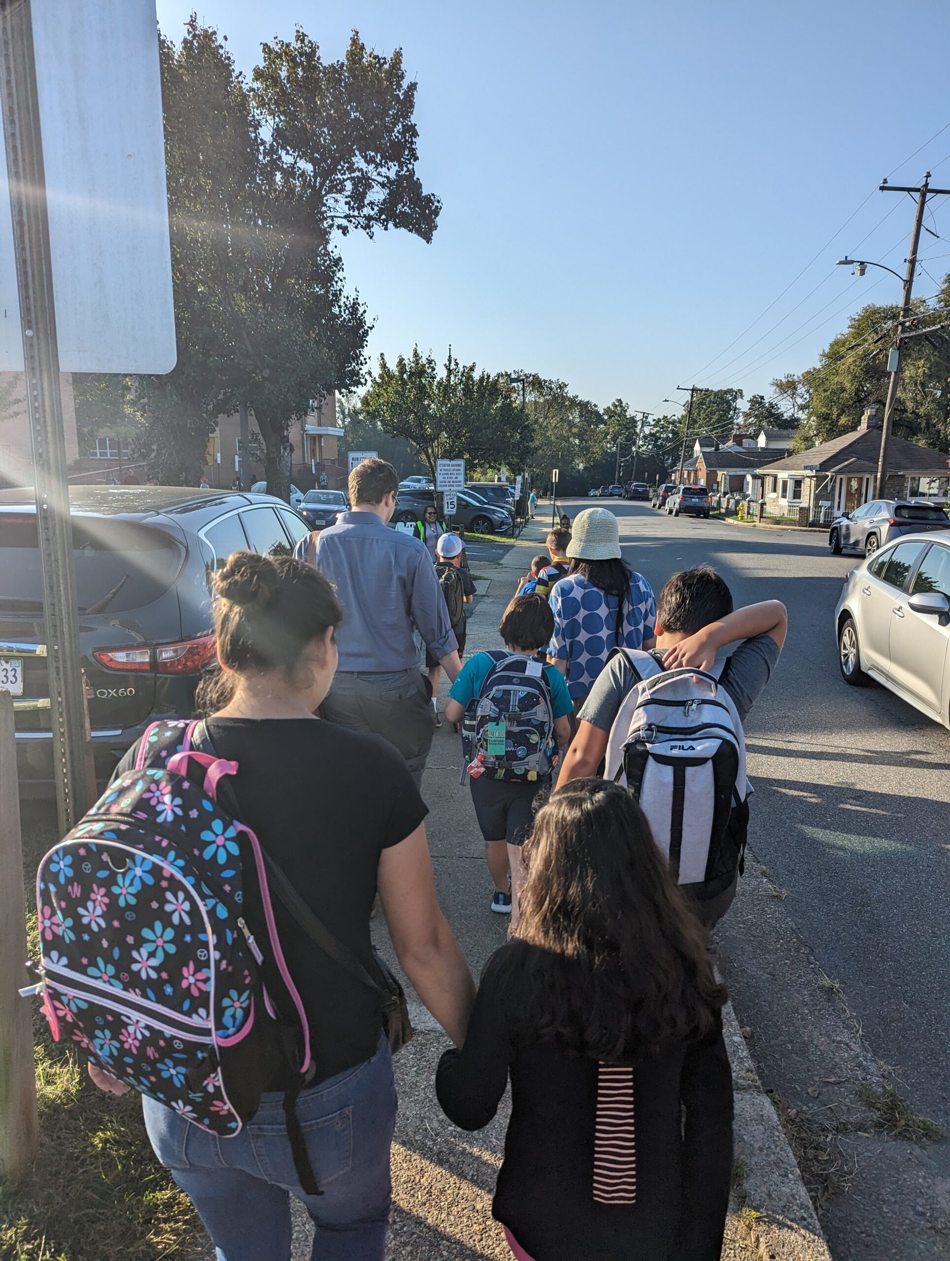 parents and students walking to school