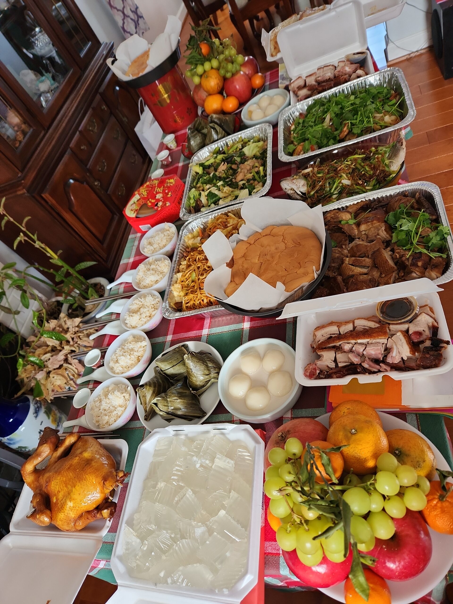 A table filled with Chinese traditional food for celebrating Lunar New Year
