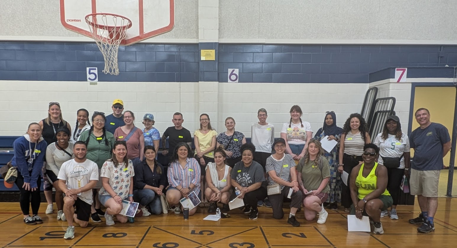 All parents volunteers are pictured inside gym on Hoffman-Boston field day 2026.